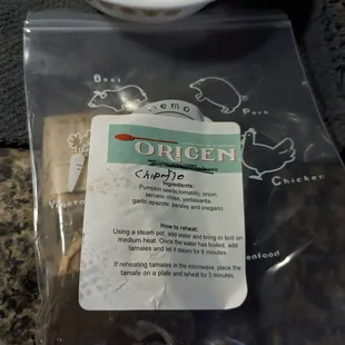 a bowl and a packet of oatmeal