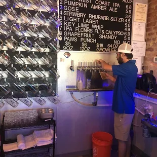 a man pouring a drink