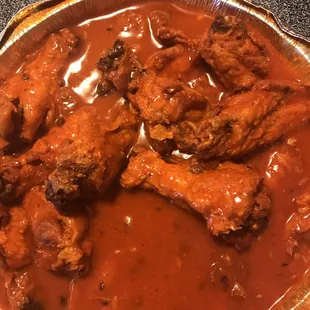  chicken wings in a sauce