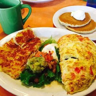 El Paso omelette with a side or pancakes. Yummy. All the food here looks delicious and plentiful. Side note: Bobtail parking!