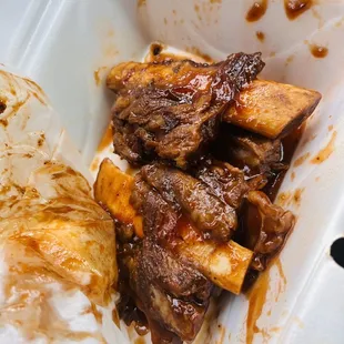 a meal in a styrofoam container