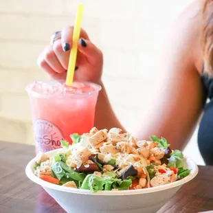 a woman eating a salad