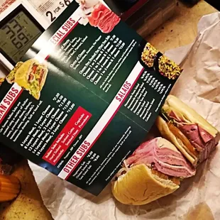 a menu and a sandwich