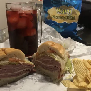 Faygo pop (rock and rye), Better made potato chips (Detroit staples)......  $10 - 18-layer sub..... Best combination in town!!!!!