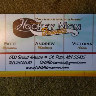 Business card with contact info.