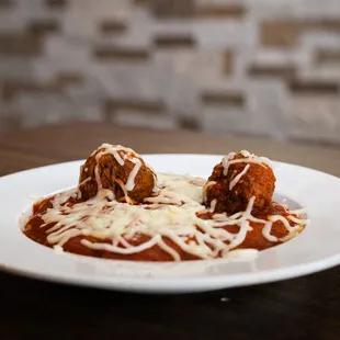 meatballs and sauce on a plate