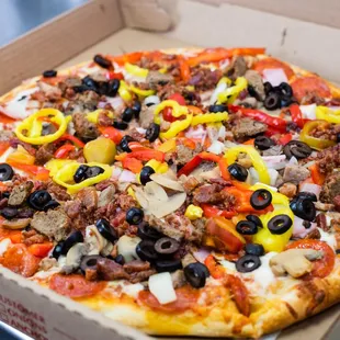 pepperoni, sausage, olives, and peppers