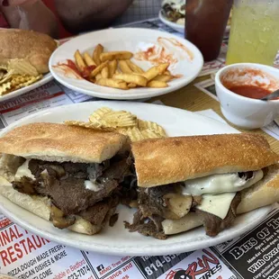 Cheesesteak with mushrooms. Meal comes with chips.