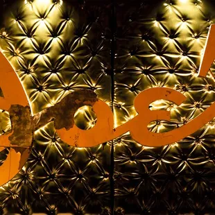 The original sign that hung at 144 Taylor Street in 1937, which was salvaged from the fire that destroyed the location in 2007