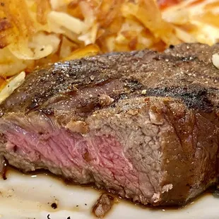 6 oz NY steak,  2 eggs, hash browns  and with toast