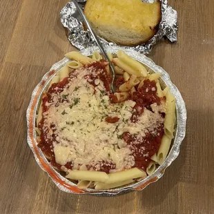 Mostaccioli marinara with garlic bread