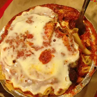 Mouth watering baked mostaccioli with chicken parm (by request). Always cheesy and delicious..