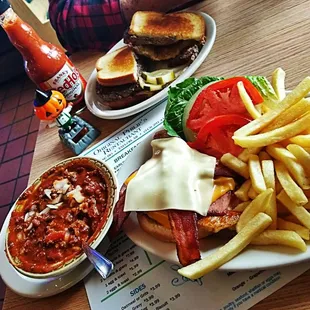 a plate of food with fries and a sandwich