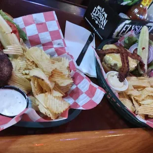 two burgers and chips
