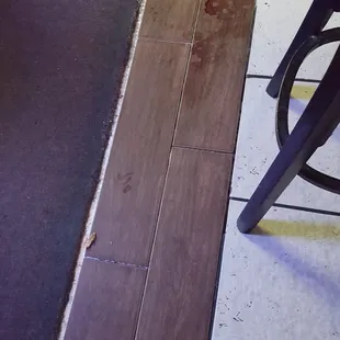 Very uniform flooring throughout the bar. High quality work.