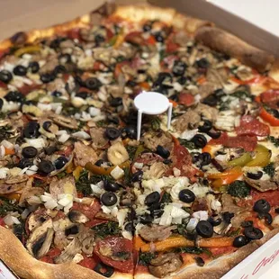 a whole pizza in a box