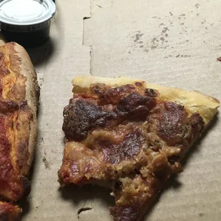Burnt, cold very little toppings