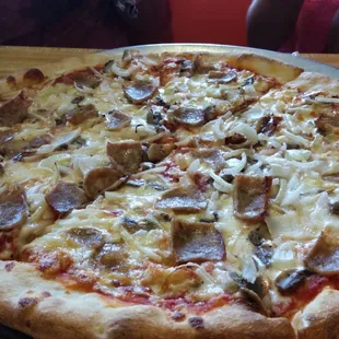 a pizza with mushrooms and cheese