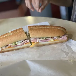Ham/ turkey with cheddar cheese and all the trimmings / good size sub