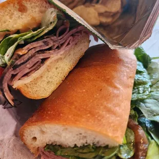 Black Beef sandwich and pickled potato kettle chips. Loaded with flavor!