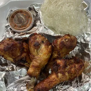 Fried chicken with sticky rice, papaya salad and Nam Tok