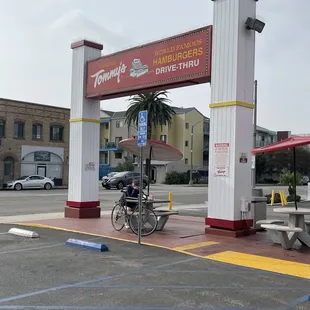 Street sign and tables in front of