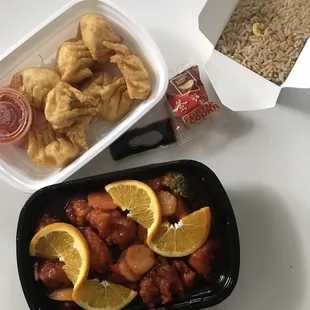 Orange chicken, fried rice, and cheese wontons.