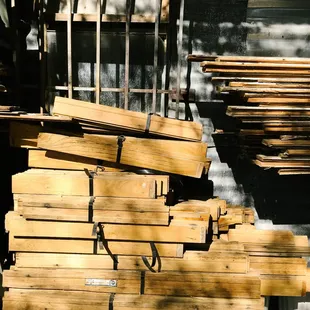 Originate natural building's salvage yard featuring and salvaged wood flooring | Tucson, AZ