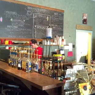 a man standing behind the counter