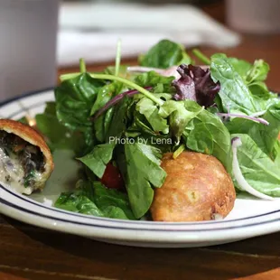 Empanada Verde ($10.25) - forest mushrooms, piquillo peppers and Manchego cheese