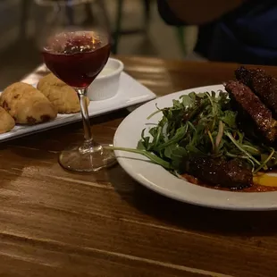 Left to right: Trio de Empanadas, Sangria,  Adobo Smoked Churrasco