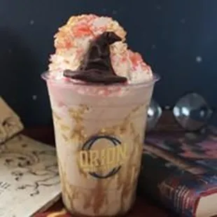 a drink with whipped cream and chocolate