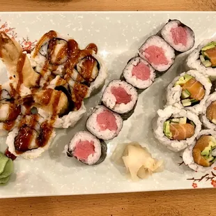 various types of sushi on a plate