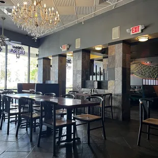 a dining room with a chandelier