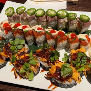 Top to bottom: Distinguished Gentlemen*, Super Mexican Roll, Hadouken Roll with a side of Eel Sauce