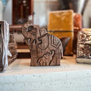 a close up of a wooden elephant