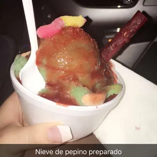 a person holding a bowl of food