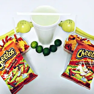 a bowl of chips and limes