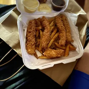 Fried Chicken Tender Platter with a side Potato Salad. BBQ sauce and honey mustard sauce for dipping.