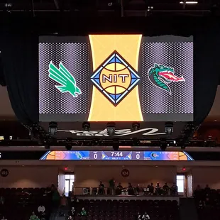 a large screen with logos on it