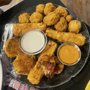 Appetizer plate: crab cakes-fried mushrooms-fried cheese-bacon wrapped shrimp