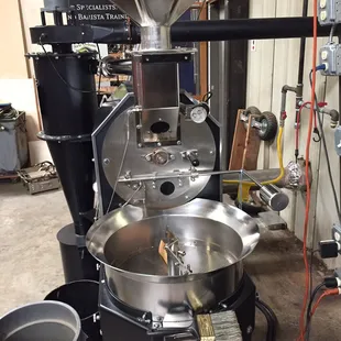 a coffee grinder in a warehouse