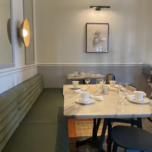 a dining table with place settings