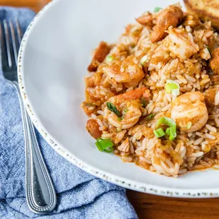 a plate of shrimp and rice