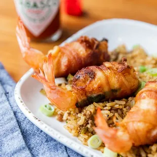 a plate of shrimp and rice