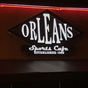 neon sign for orleans sports cafe