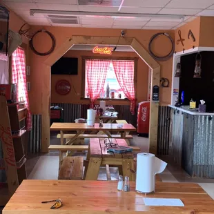 tables and benches in a restaurant