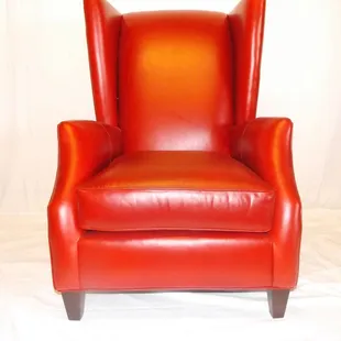 Eye-catching leather wing chair.