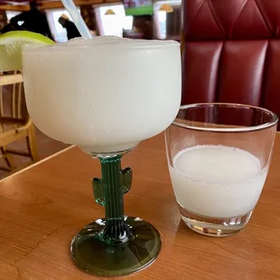 a margarita and a glass of milk