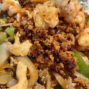 a plate of food with shrimp and vegetables